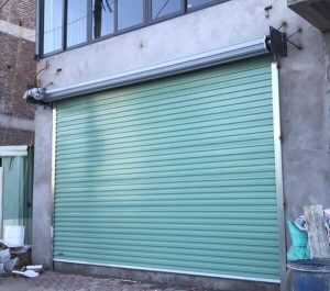 lắp đặt cửa cuốn kéo tay