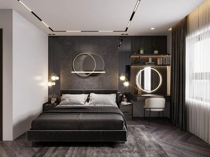 A bedroom with a bed and a mirror Description automatically generated