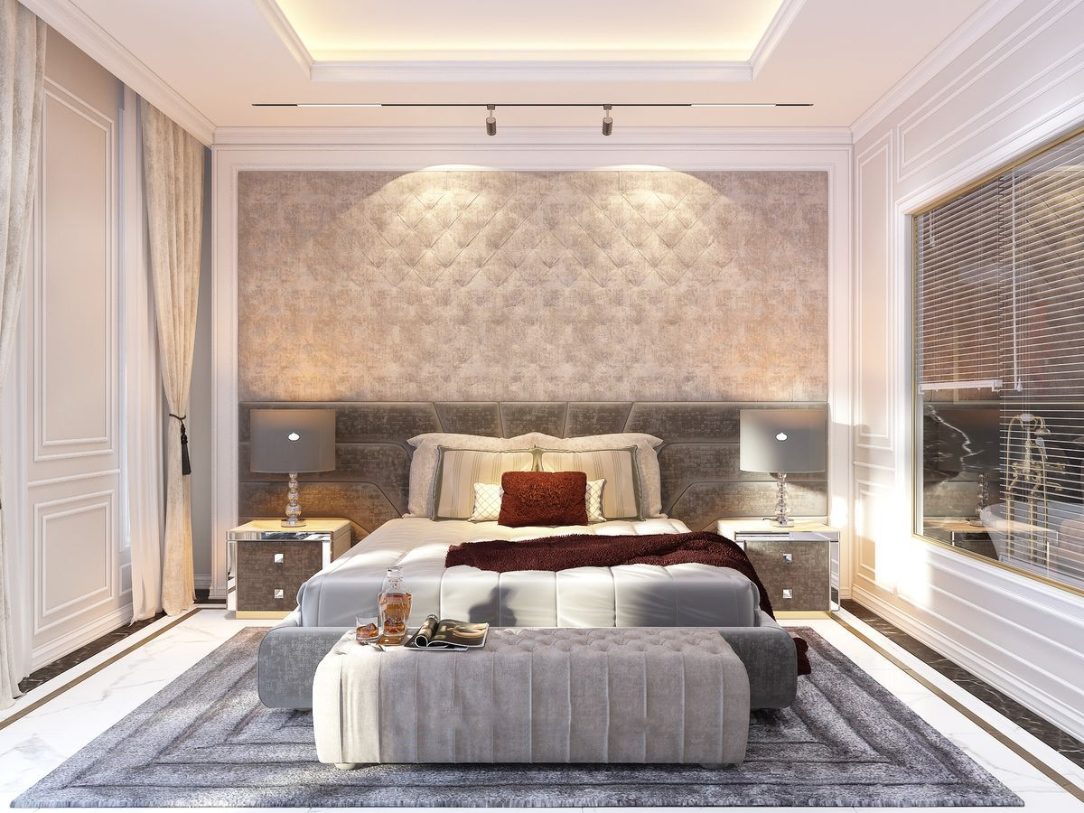 A bedroom with a bed and a mirror Description automatically generated