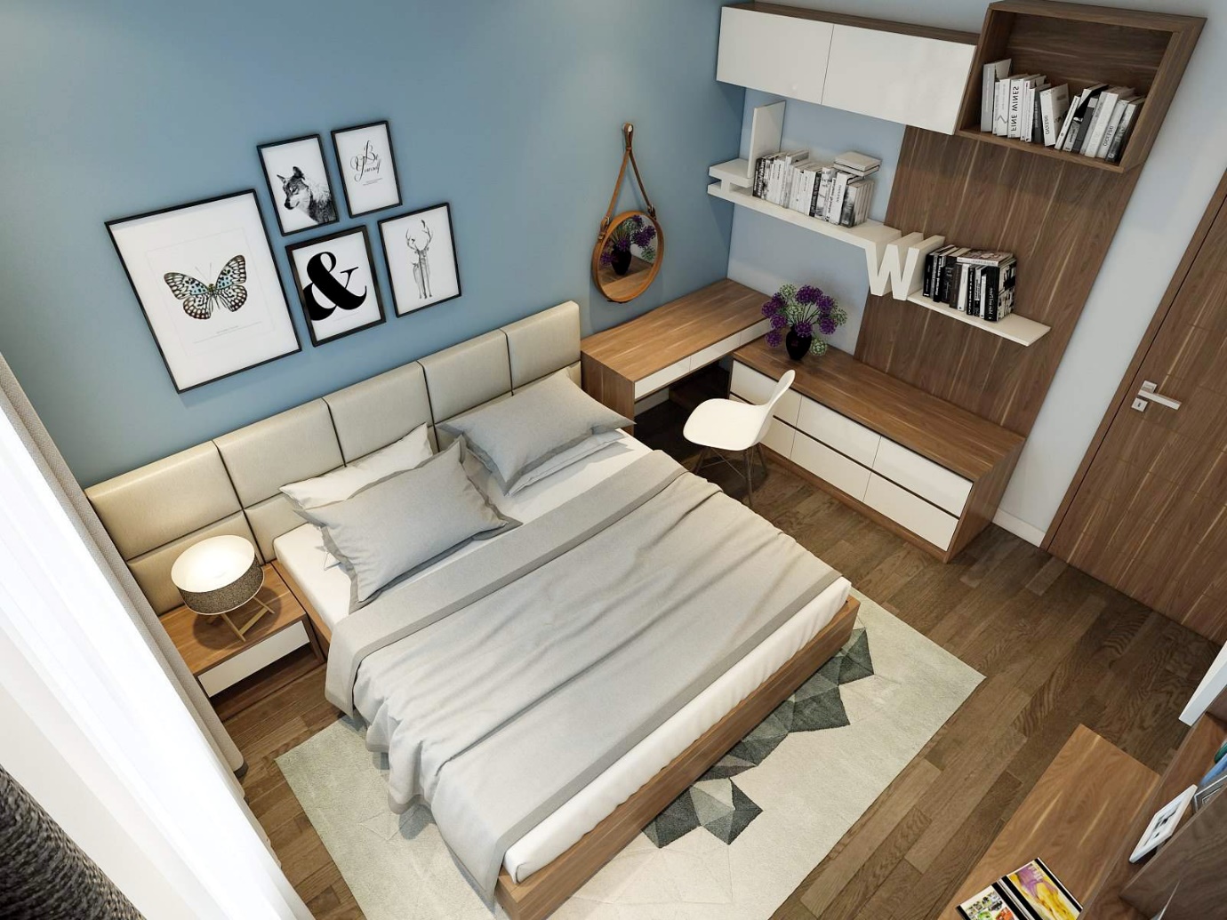 A bedroom with a bed and desk Description automatically generated