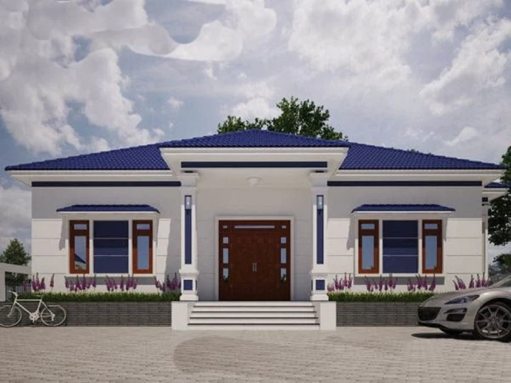 A car parked in front of a house Description automatically generated