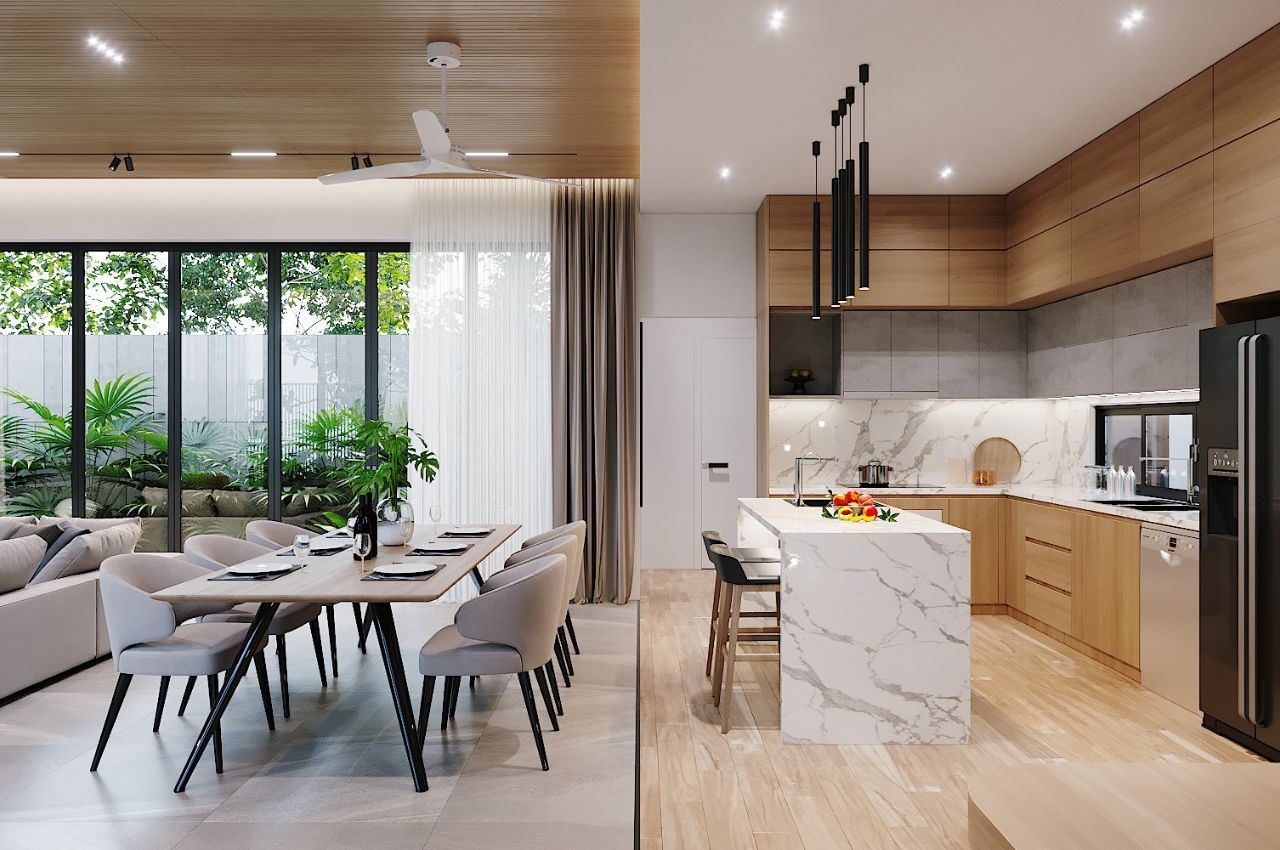 A kitchen and dining room with a table and chairs
Description automatically generated