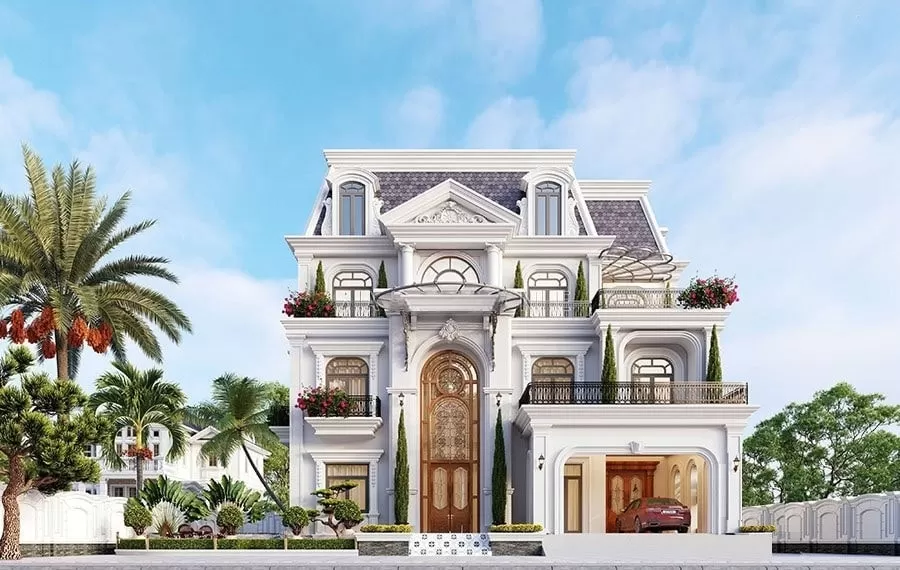 A large white house with trees and a car parked in front Description automatically generated