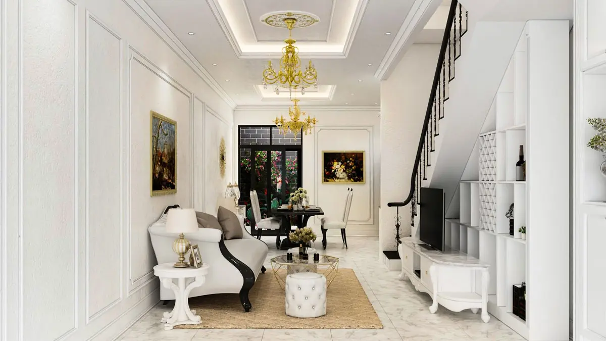 A living room with a staircase and a couch Description automatically generated