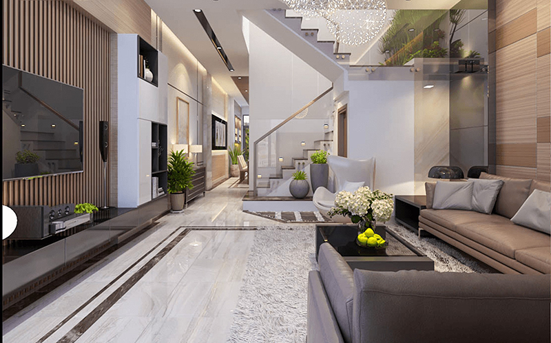 A living room with a staircase and a couch
Description automatically generated