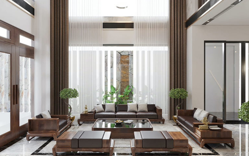 A room with a couch and a coffee table Description automatically generated