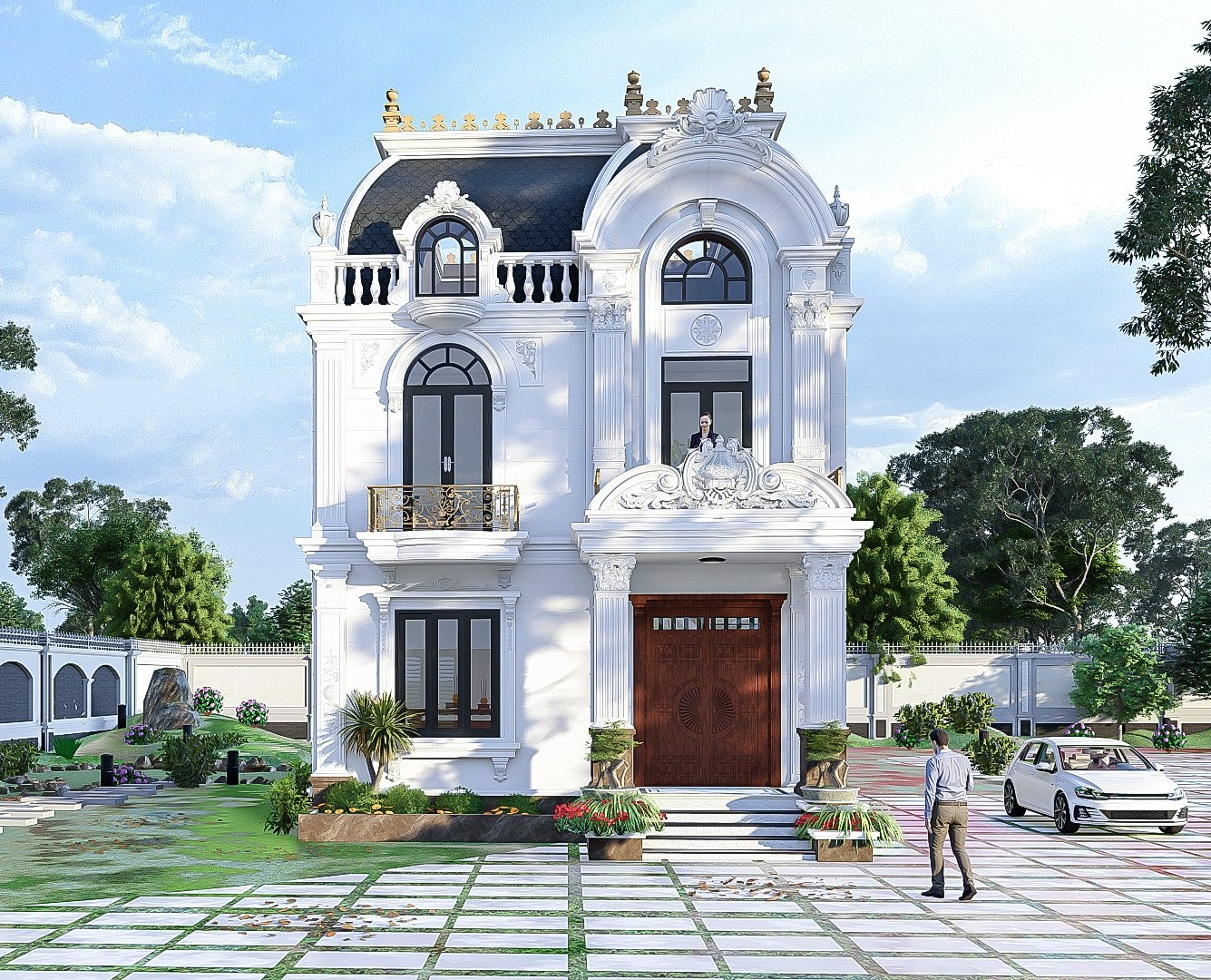 A white house with a couple of cars in front of it Description automatically generated
